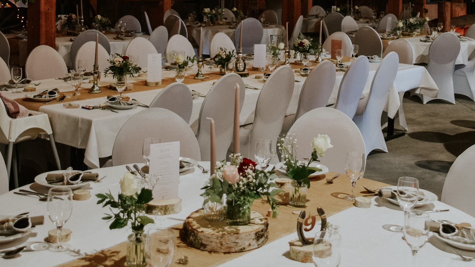 Tiffany chairs around a banquet table with full place settings