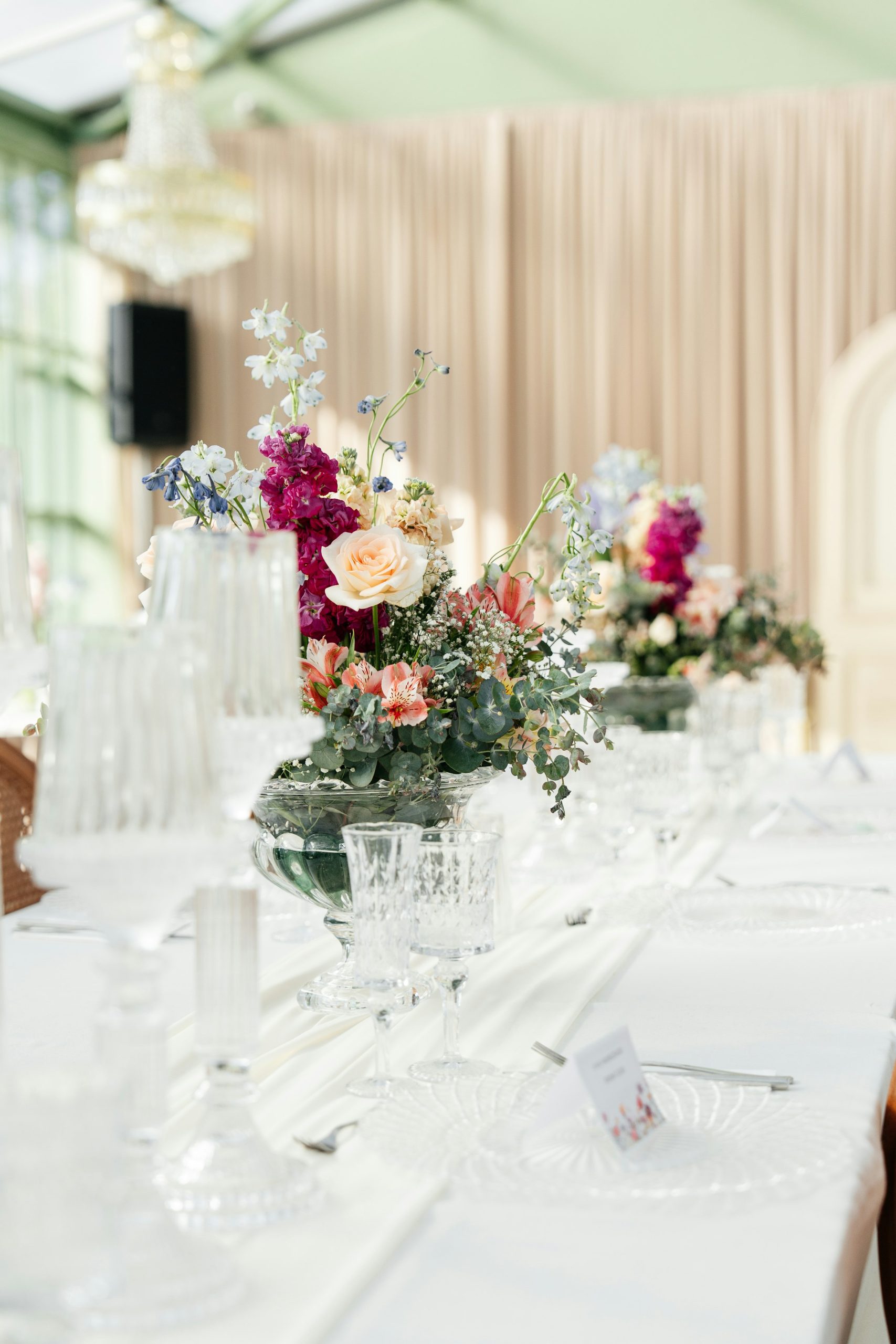 Long banquet table with floral centerpieces